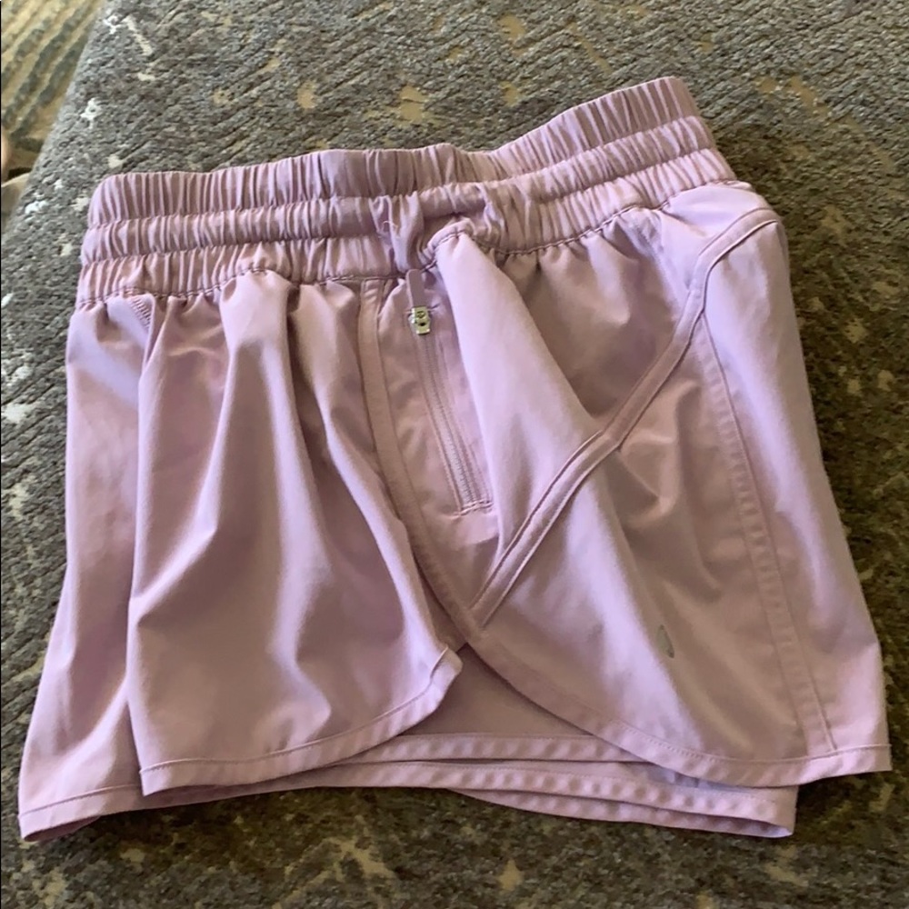 Purplish pink Lululemon Tracker V 4” shorts